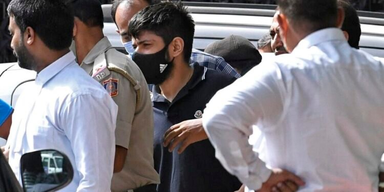 Gangster Lawrence Bishnoi, the mastermind in singer Sidhu Moose Wala’s murder case, has been sent to police remand till July 6.  Speaking to ANI, Amritsar ACP Palwinder Singh said, “Gangster Lawrence Bishnoi has been sent to police remand till July 6.” Bishnoi was produced in the Amritsar court on Tuesday.  The Patiala House Court of Delhi on June 14, had allowed Punjab Police to arrest Bishnoi in connection with Singer Sidhu Moose Wala’s murder case.  The court also allowed the Punjab Police transit application and directed Punjab Police to ensure that the medical examination of the accused Lawrence Bishnoi is conducted as per law/rules before leaving Delhi and also before his production before the concerned Court of CJM, Mansa, Punjab.  Sidhu Moose Wala was shot dead by unidentified assailants in Jawaharke village of Punjab’s Mansa district on May 29.  The incident took place a day after his security was withdrawn by the Punjab police among 424 others.  Punjab Police had earlier told Patiala House Court of Delhi that gangster Bishnoi is an accused in singer Moose Wala’s murder case. During the investigation of this case, it was revealed that Lawrence Bishnoi was a key conspirator and his custodial interrogation is necessary.  The Supreme Court of India on Monday said that it will hear on July 11, the plea of accused Lawrence Bishnoi’s father challenging the transit remand to Punjab Police. Advocate Sangram Singh stated that Lawrence was unable to get any legal assistance in Mansa, Punjab.  The bench of Justice Suryakant and Justice JB Pardiwala on Monday while fixing the matter for hearing on July 11, 2022, also observed that since the murder took place there Punjab Police should probe the case. The Court also asked Lawrence’s father’s lawyer to approach Punjab and Haryana HC to get legal aid counsel.  The matter was mentioned on Monday by Advocate Sangram Singh who appeared for Lawrence Bishnoi’s father. He stated that Lawrence Bishnoi’s custody to Punjab Police is not according to law and is illegal.