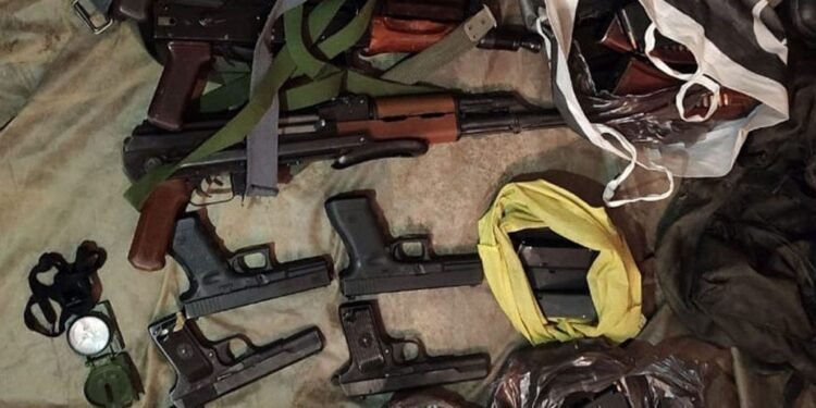 Security forces recover AK rifles, pistols along with narcotics in Baramulla