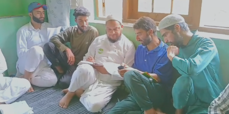 Senior JD(U) Leader Zahoor Ahmad Bhat Discusses Election Strategy with Party Workers in Malikpura Hajin
