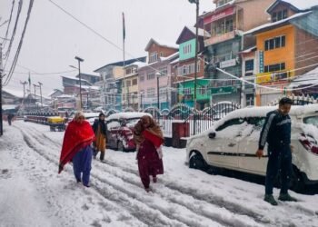 Stranded tourists find shelter in mosque amid heavy snowfall in Kashmir